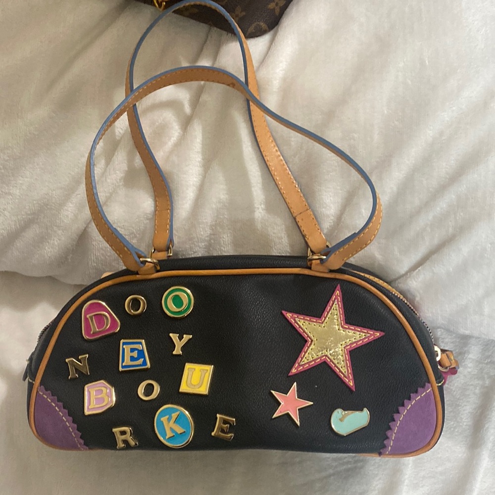 Dooney & Bourke stars and scattered letter purse